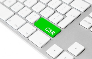 white keyboard with a green key saying csr
